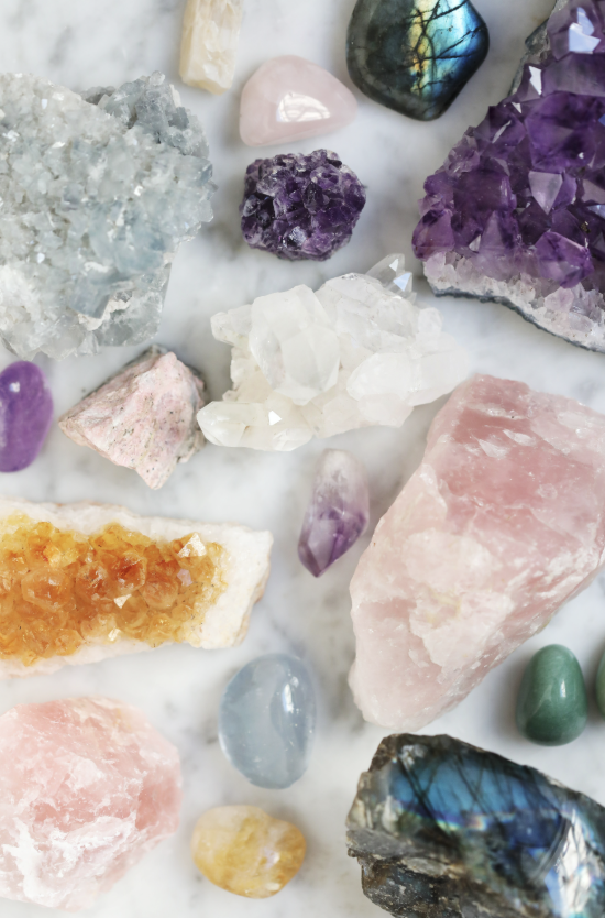 An assortment of quartz, amethyst, rose quartz, and other crystals